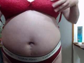 curly-greeneyed CamSoda Model